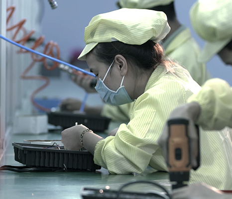 A worker is operating machine