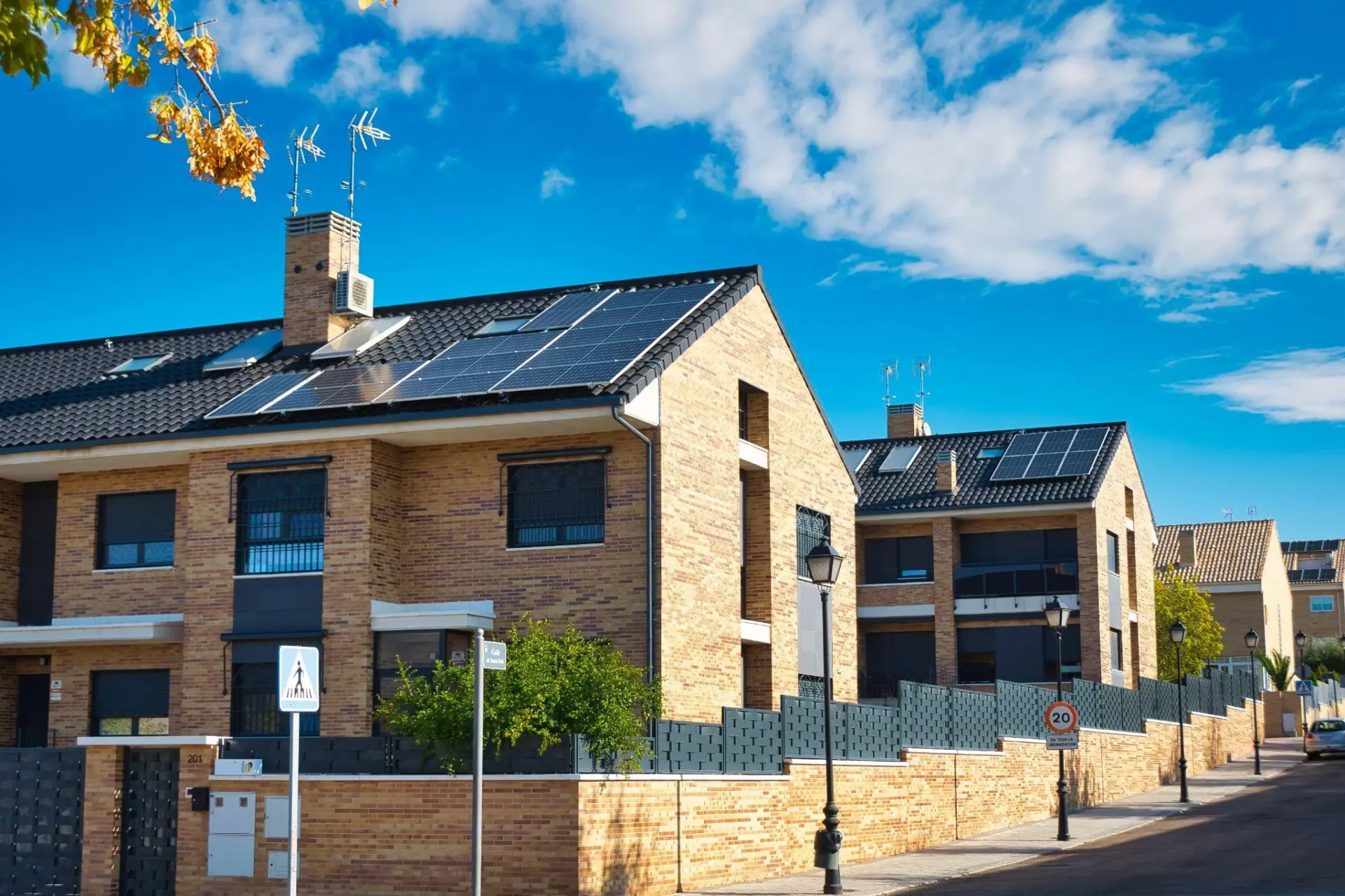 aerial view of a private house with solar panels on the roof